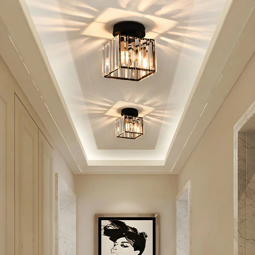 Modern crystal ceiling light with brass finish, ideal for creating a warm and elegant ambiance in bedrooms or hallways.
