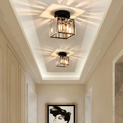 Modern crystal ceiling light with brass finish, ideal for creating a warm and elegant ambiance in bedrooms or hallways.