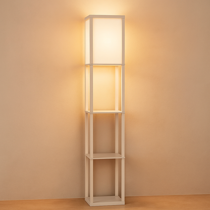 Modern floor lamp with three shelves and warm fabric shade, perfect for combining lighting and storage in living rooms or bedrooms.