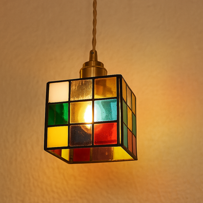 Handmade Tiffany glass pendant light with copper accents, ideal for adding warmth and elegance to living rooms or bedrooms.