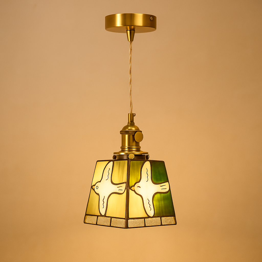 Handmade Tiffany glass pendant light with copper accents, ideal for adding warmth and elegance to living rooms or bedrooms.