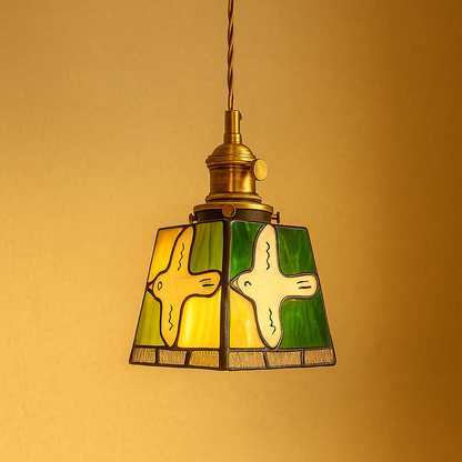 Handmade Tiffany glass pendant light with copper accents, ideal for adding warmth and elegance to living rooms or bedrooms.