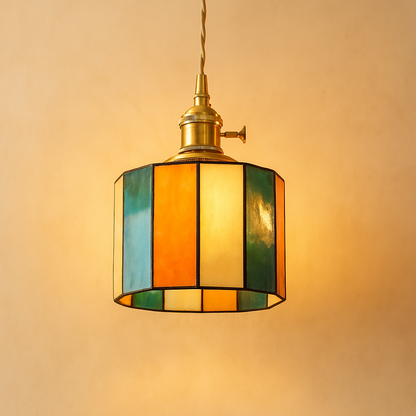 Handmade Tiffany glass pendant light with copper accents, ideal for adding warmth and elegance to living rooms or bedrooms.