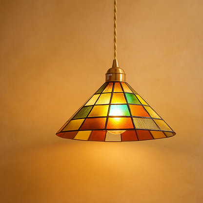 Handmade Tiffany glass pendant light with copper accents, ideal for adding warmth and elegance to living rooms or bedrooms.