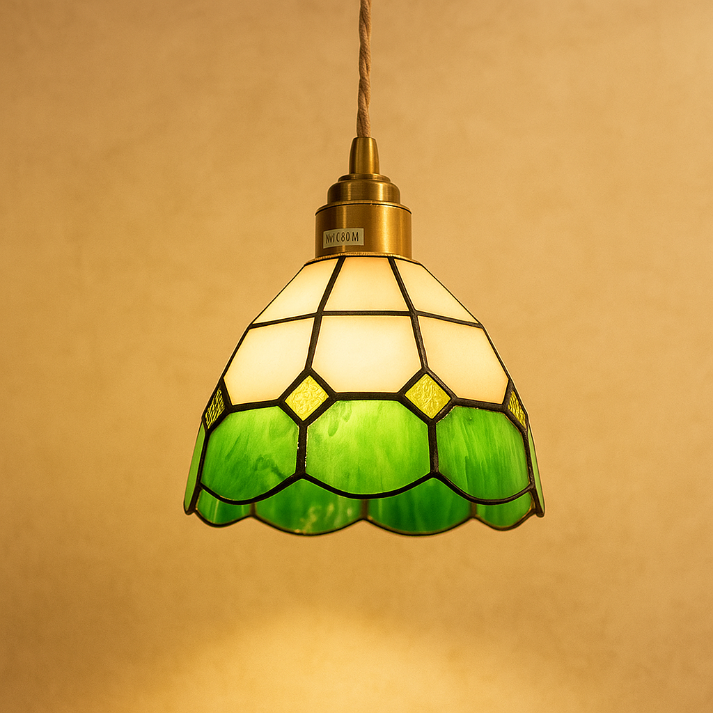 Handmade Tiffany glass pendant light with copper accents, ideal for adding warmth and elegance to living rooms or bedrooms.