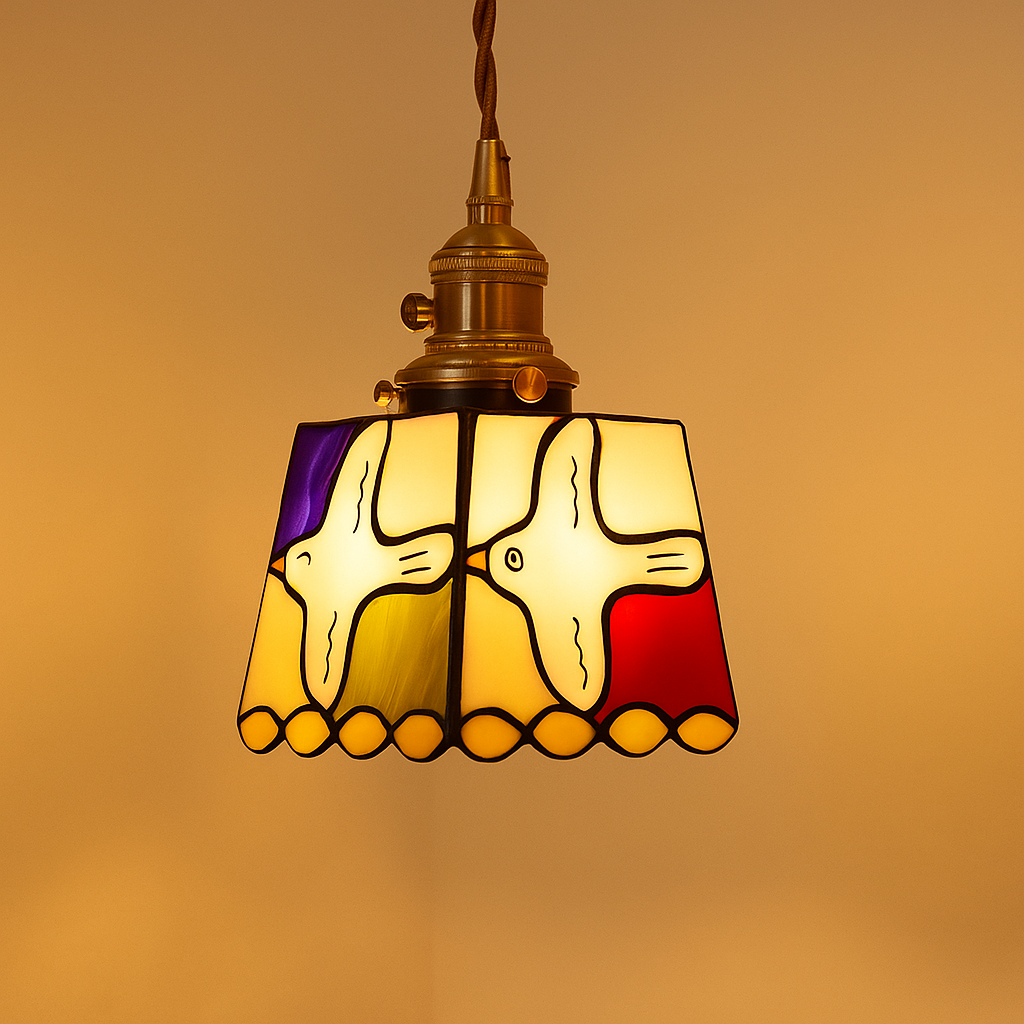 Handmade Tiffany glass pendant light with copper accents, ideal for adding warmth and elegance to living rooms or bedrooms.