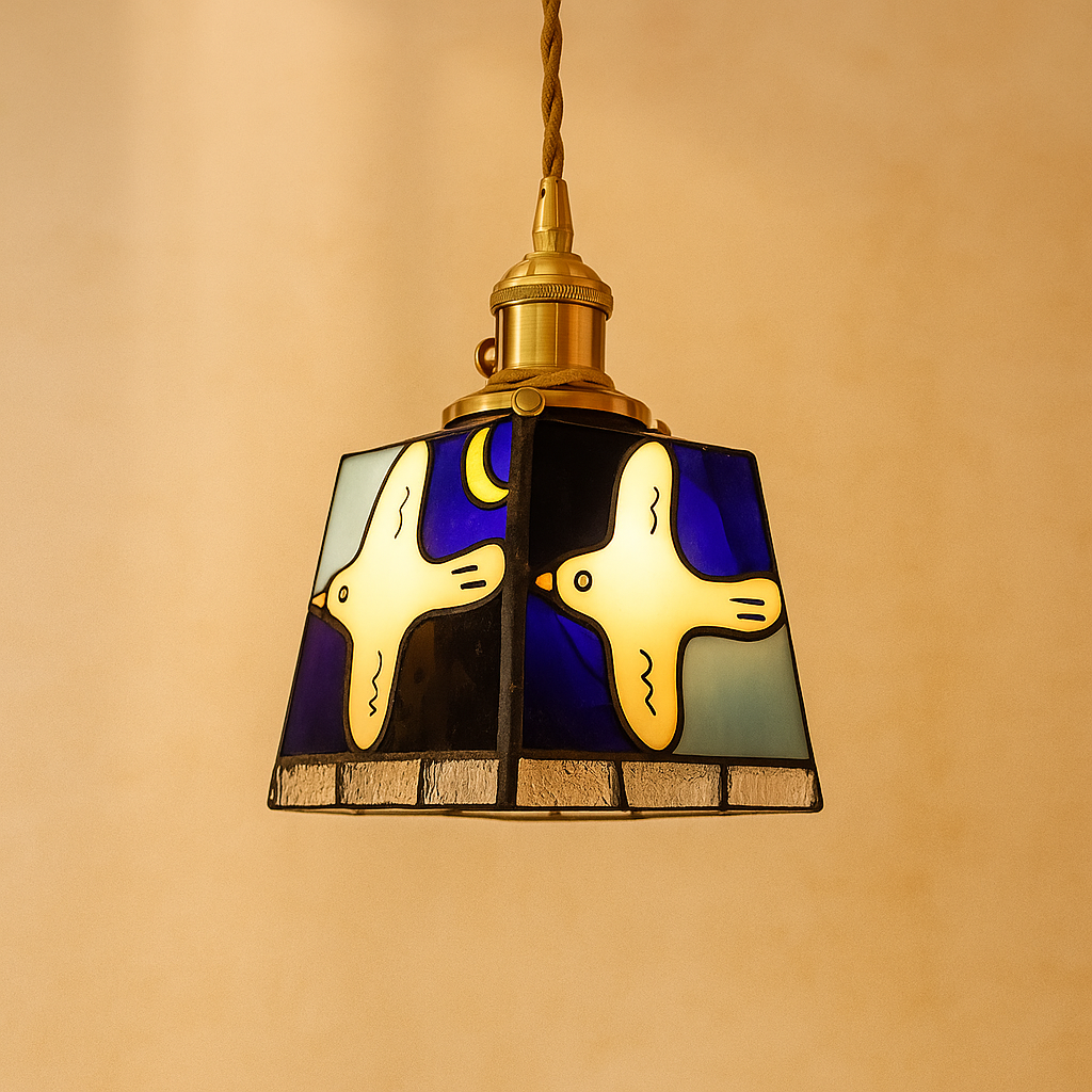 Handmade Tiffany glass pendant light with copper accents, ideal for adding warmth and elegance to living rooms or bedrooms.