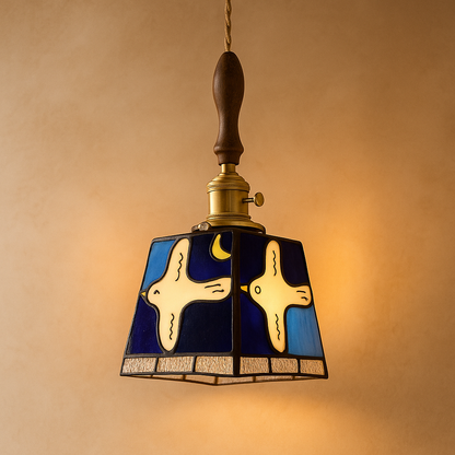 Handmade Tiffany glass pendant light with copper accents, ideal for adding warmth and elegance to living rooms or bedrooms.